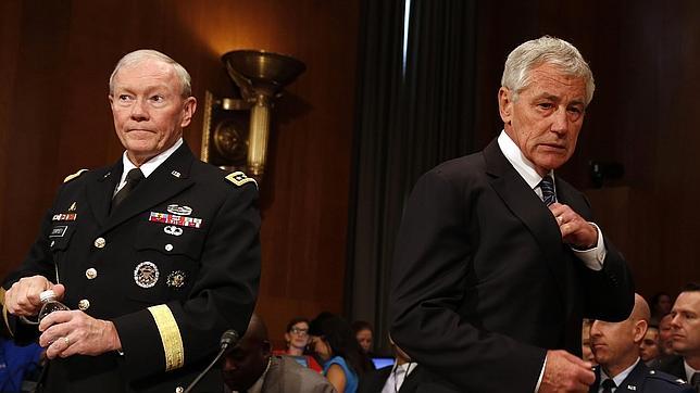 El jefe del Estado Mayor, Martin Dempsey, junto al Secretario de Defensa, Chuck Haguel, hoy, en Washington