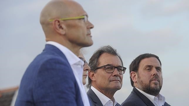 Raül Romeva, Artur Mas y Oriol Junqueras