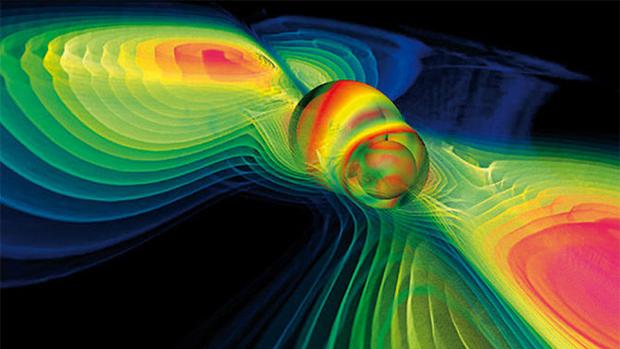 Simulación por ordenador de la fusión de dos agujeros negros y de ondas gravitacionales liberadas