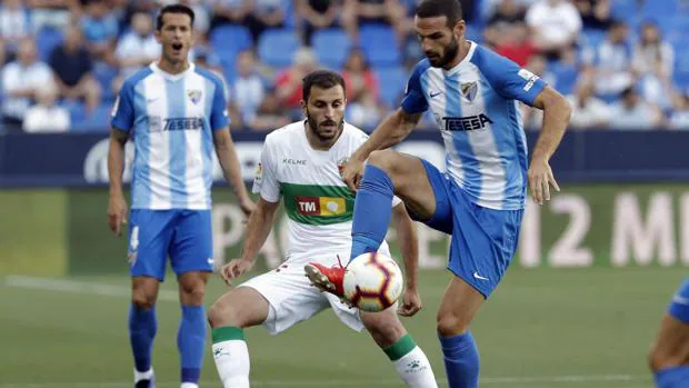Resultado Málaga -Elche: El Málaga golea y espera al Deportivo en el camino  hacia Primera