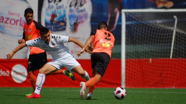 Un lance del partido