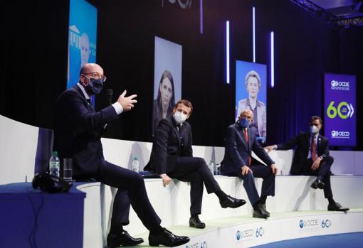 From left to right, Charles Michel, Emmanuel Macron, Ángel Gurría and Pedro Sánchez, at an event to mark the 60th anniversary of the OECD in Paris