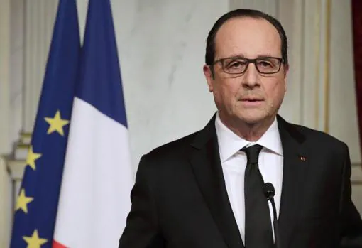 The French flag under President Hollande shows a softer blue, similar to that of the EU flag AFP