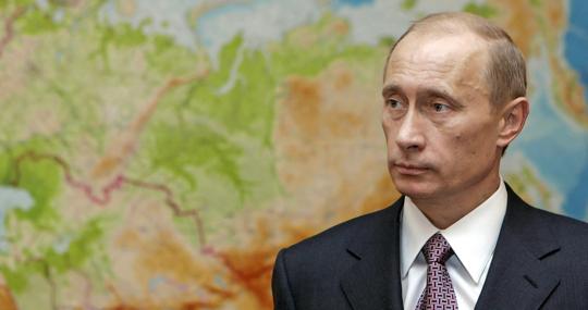 El presidente de Rusia, Vladímir Putin, con un mapa de Rusia de fondo en 2006