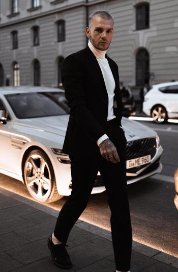 Cómo llevar un traje negro y ser el más elegante